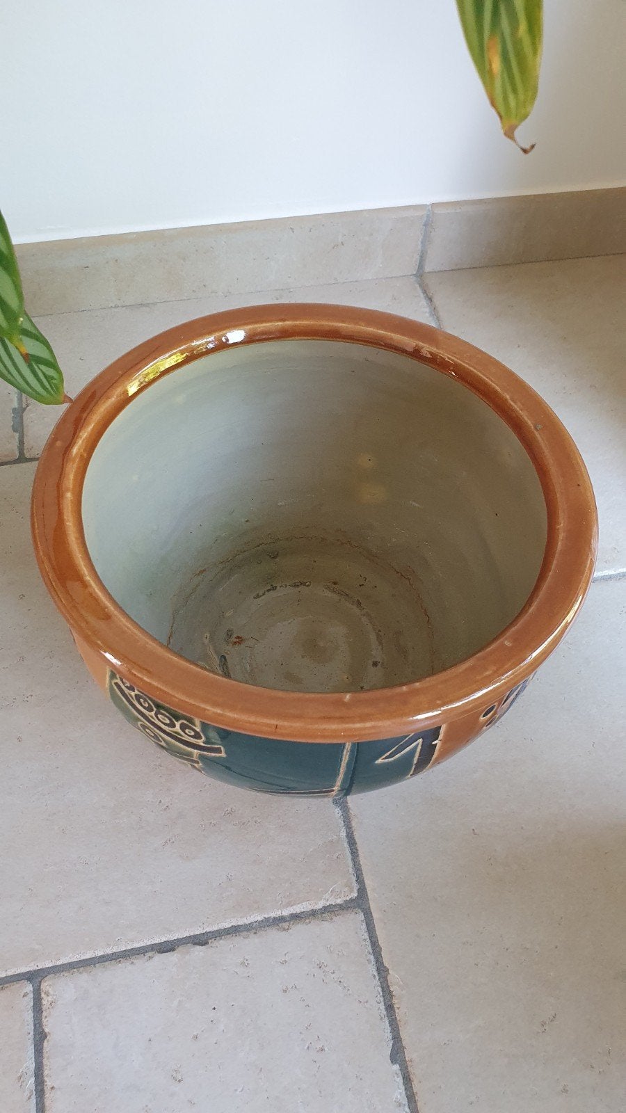 Cache-pot motif africain, Ophalen