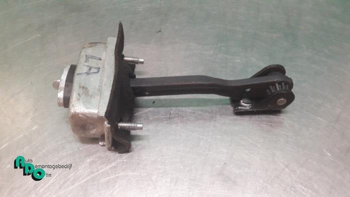 Butée 4portes arrière gauche d'un Ford Focus (Focus 04-), -, 3 mois de garantie, -, -
