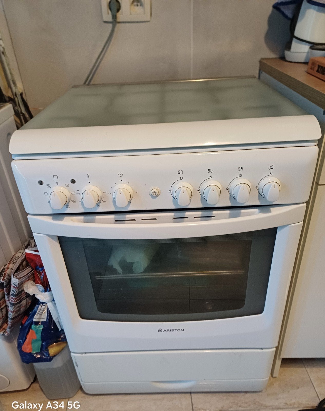 ARISTON wit fornuis/gasfornuis — (60x6), Ophalen, Gebruikt, Minder dan 85 cm, Tussenbouw