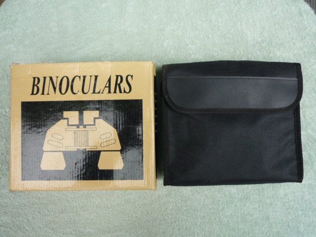 Paire de jumelle 10 X 50 avec sacoche imperméable, Enlèvement ou Envoi, Utilisé, 8 à 12x, Avec housse ou sac