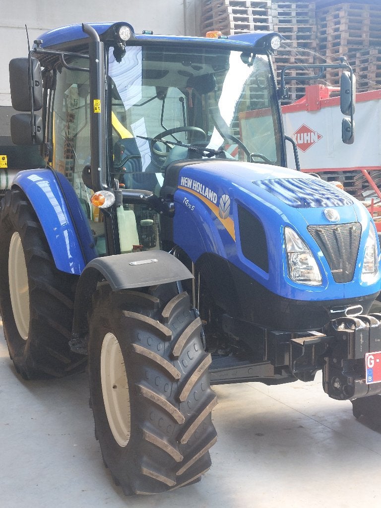 Tractor New Holland met balenpers, Ophalen, New Holland