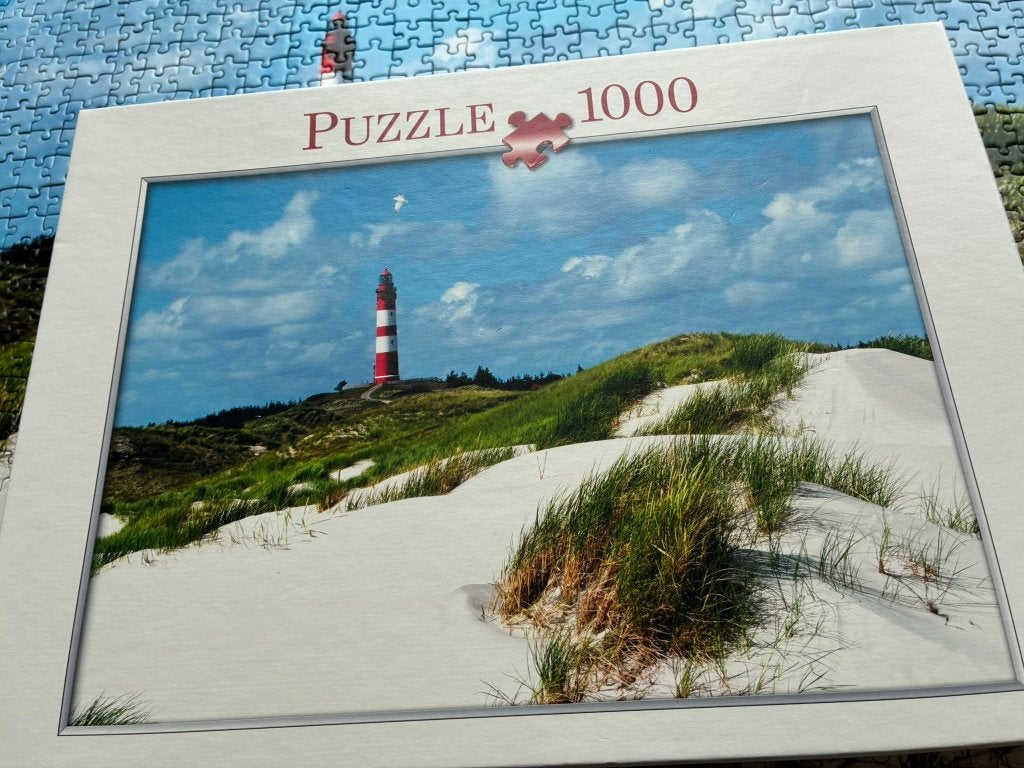 puzzel 1000 stukjes "vuurtoren in de duinen", Hobby en Vrije tijd, Ophalen of Verzenden, 500 t/m 1500 stukjes, Zo goed als nieuw