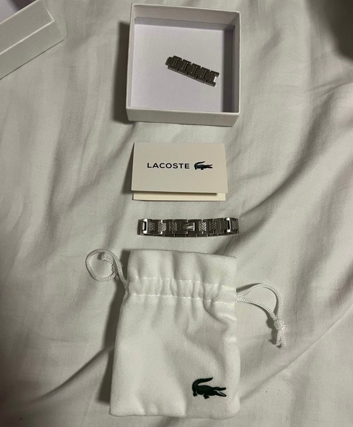 Gucci-petten, Lacoste-armband, Ophalen of Verzenden