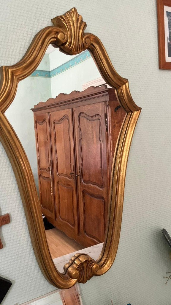Miroir ancien à cadre doré, Enlèvement