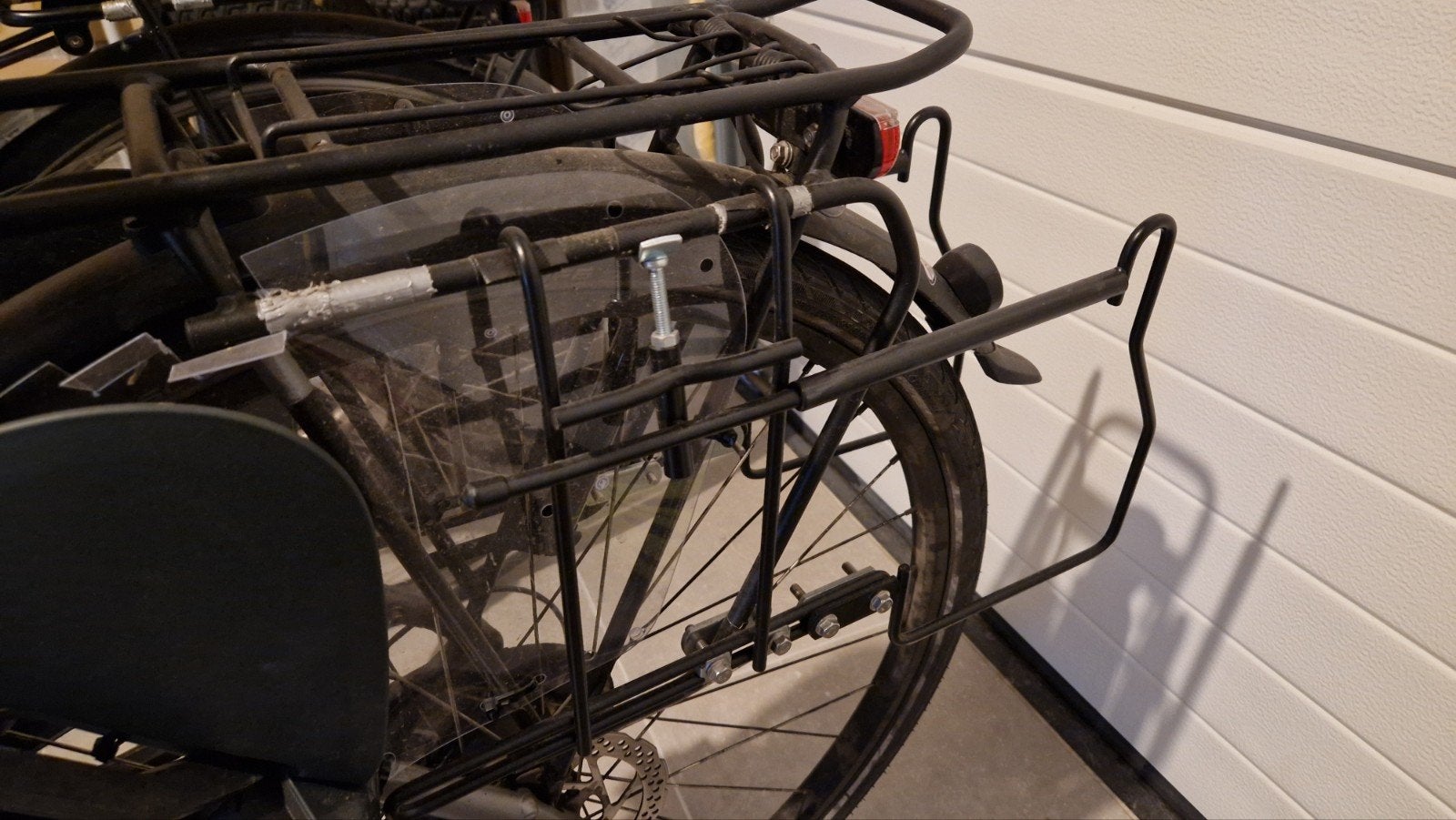 Steco pakaf-mee: fietstas kan mee met kinderzitje, Ophalen