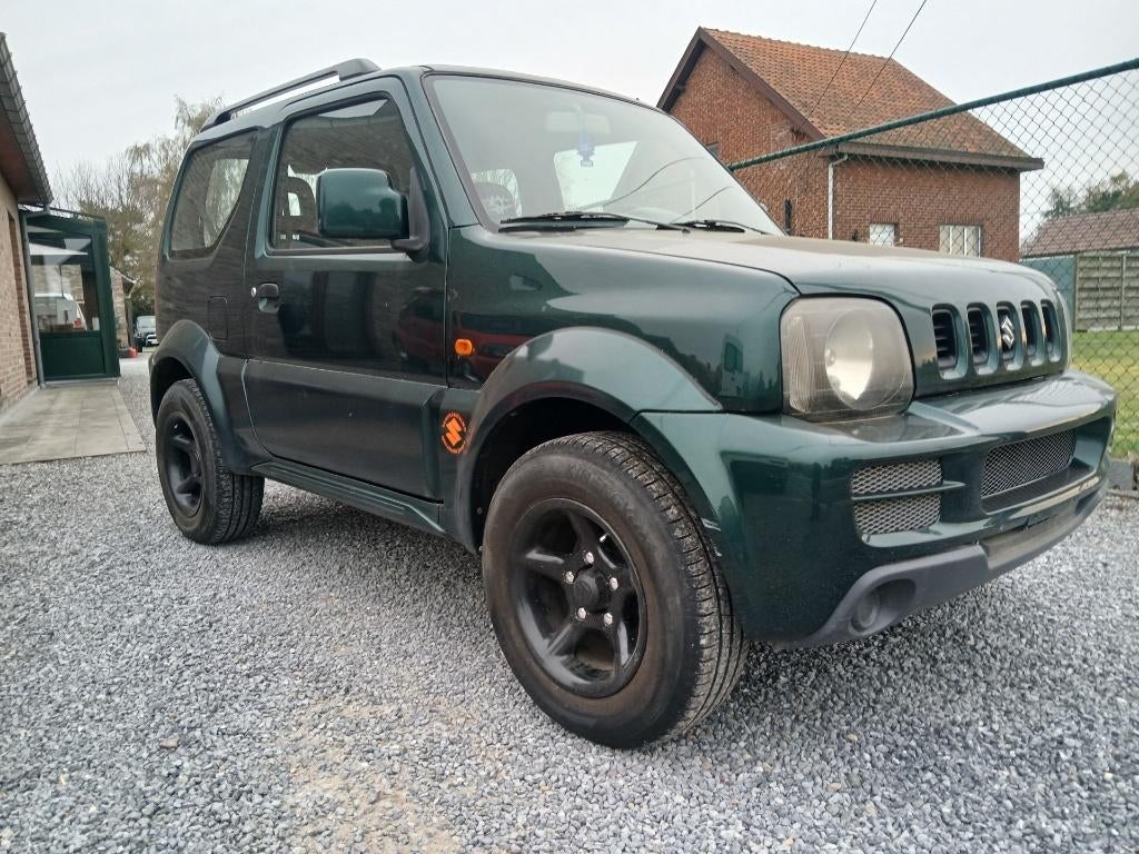 suzuki jimny #bj 2005# 1300cc benzine !!76 000km!! gekeurd, 4 zetels, Stof, Zwart, Bedrijf
