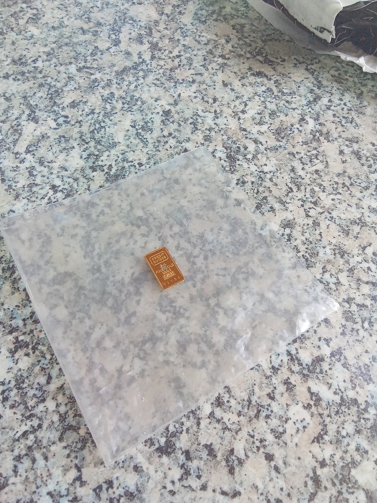 24-karaats goudbaar, Ophalen, Goud