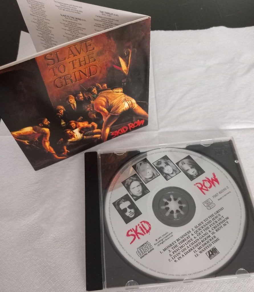 Skid Row - Slave to The Grind - 1991, CD & DVD, CD | Hardrock & Metal, Heavy metal, Comprend un livret, Enlèvement, Utilisé