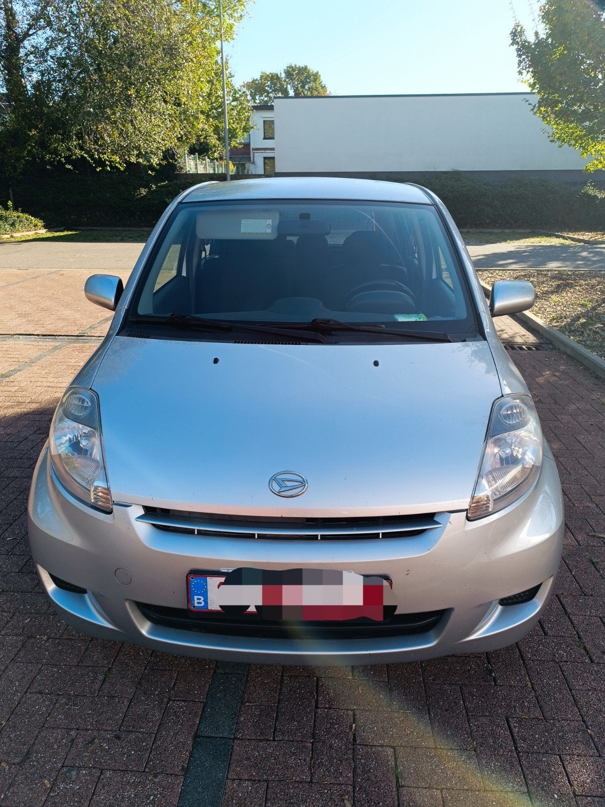 Daihatsu Sirion 1.3 benzine, jaar 2010, met 120.000 km, Auto's, Voorwielaandrijving, Stof, Zwart, 4 cilinders