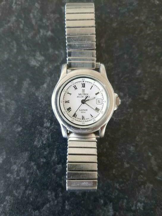 Horloge MUTRIX dame blue sea swiss made , verre saphir,, Enlèvement ou Envoi, Comme neuf