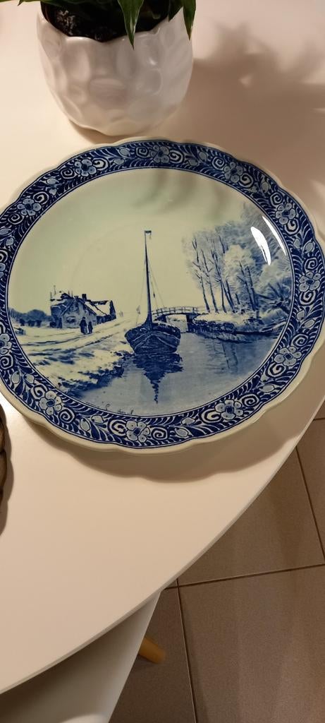 Groot bord in delft, Ophalen