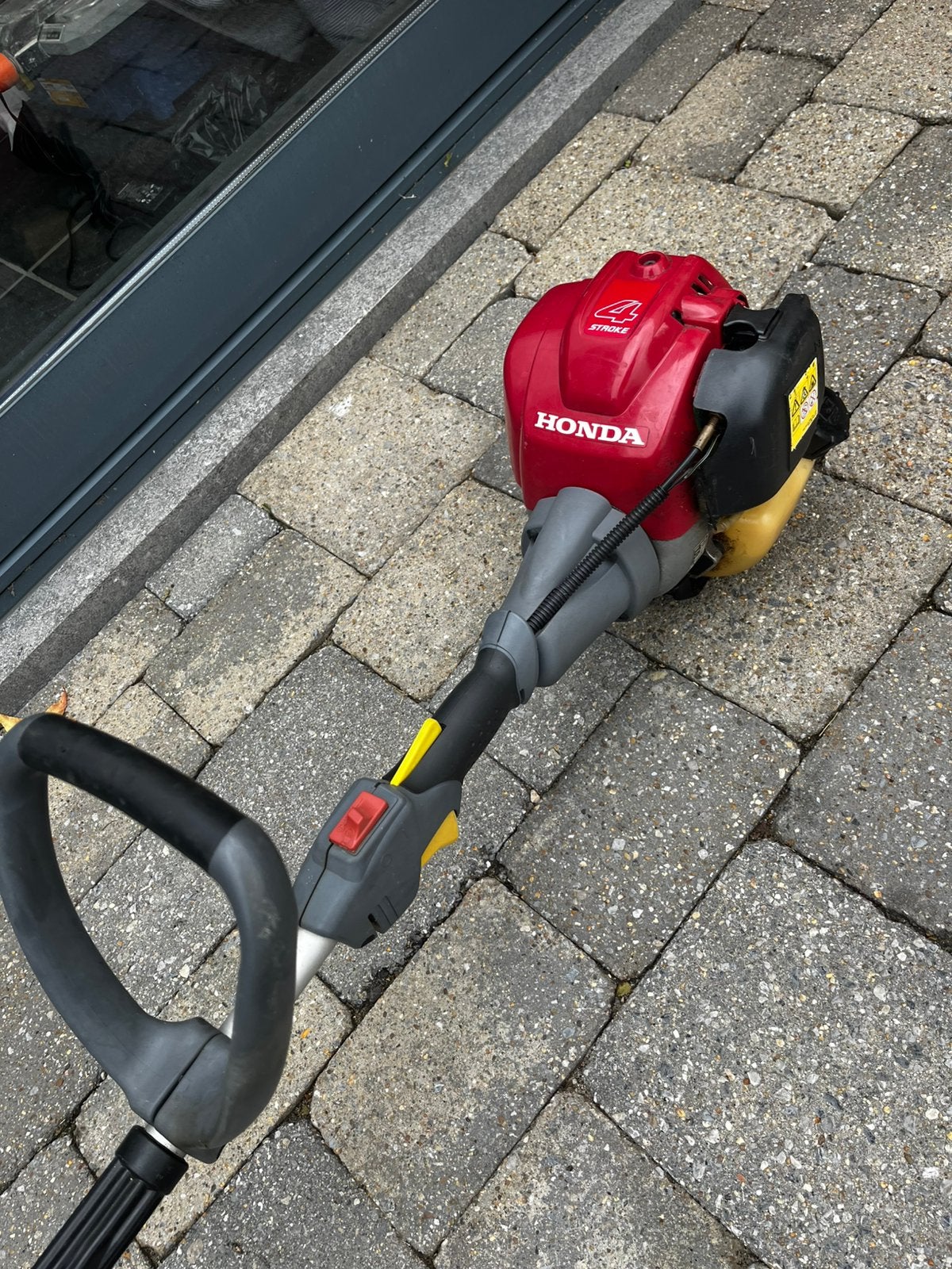 Honda 4-takt randsnijder, Tuin en Terras, Ophalen, Zo goed als nieuw
