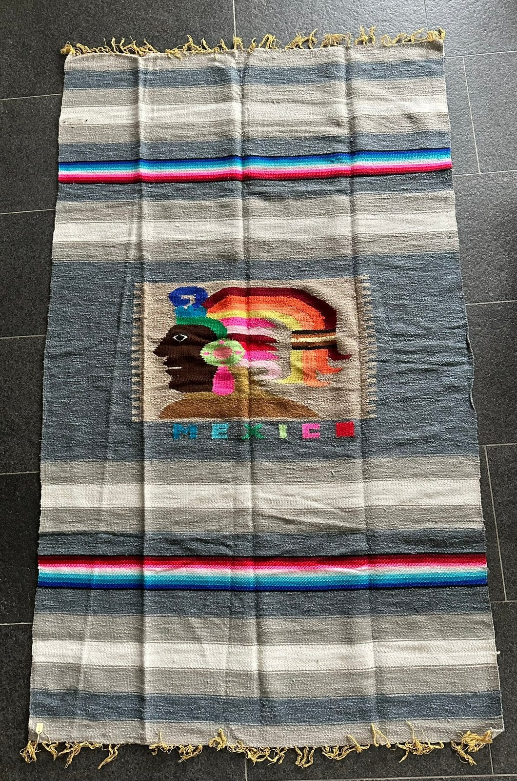 Origineel kleurrijk Mexicaans tapijt, Ophalen