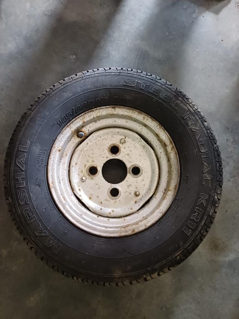 reservewiel voor aanhangwagen, Ophalen