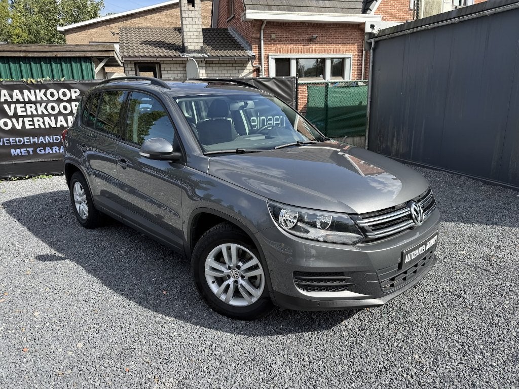 VW Tiguan 1.4i Trendline, 2016, 71.000km, Pano Dak, Navi +, Auto's, Dealer onderhouden, Stof, 4 cilinders, https://public.car-pass.be/vhr/116a170a-9f4f-41f1-a87c-50c055fab628