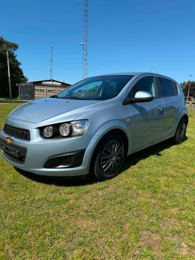 chevrolet aveo 1.2 cc benz bj 2012 met slechts 87900 km, Autos, Chevrolet, Euro 5, Achat, Boîte manuelle, Noir