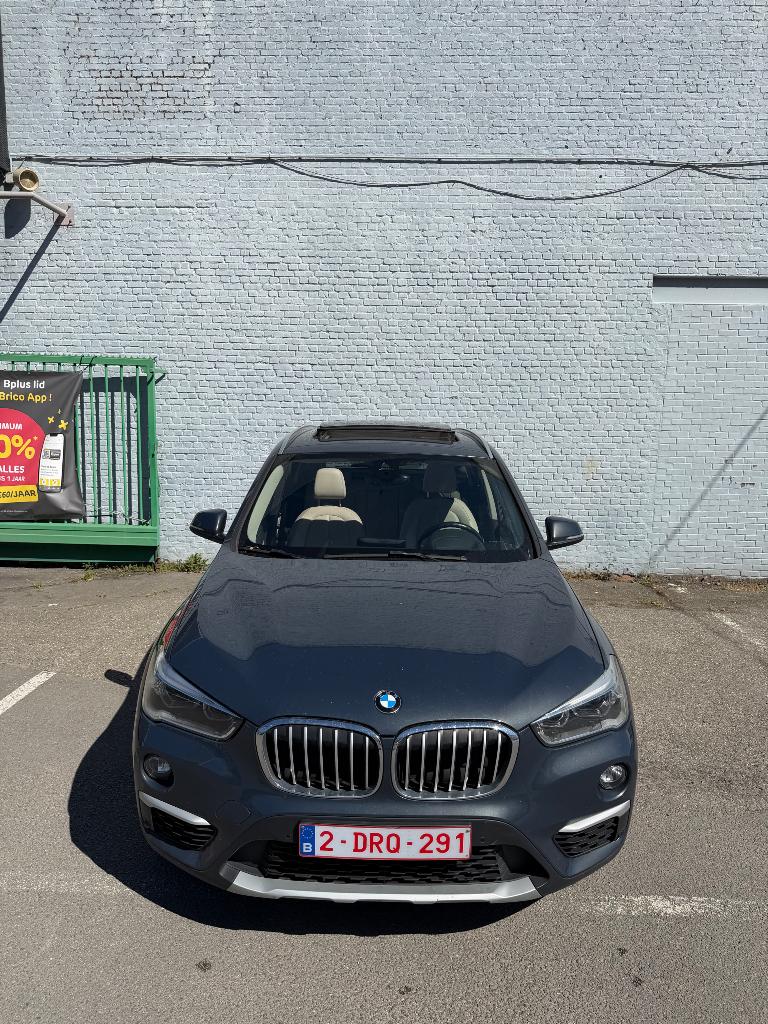 BMW X1 xDrive20i Automaat, Auto's, BMW, 1998 cc, 4 cilinders, Blauw, Adaptieve lichten