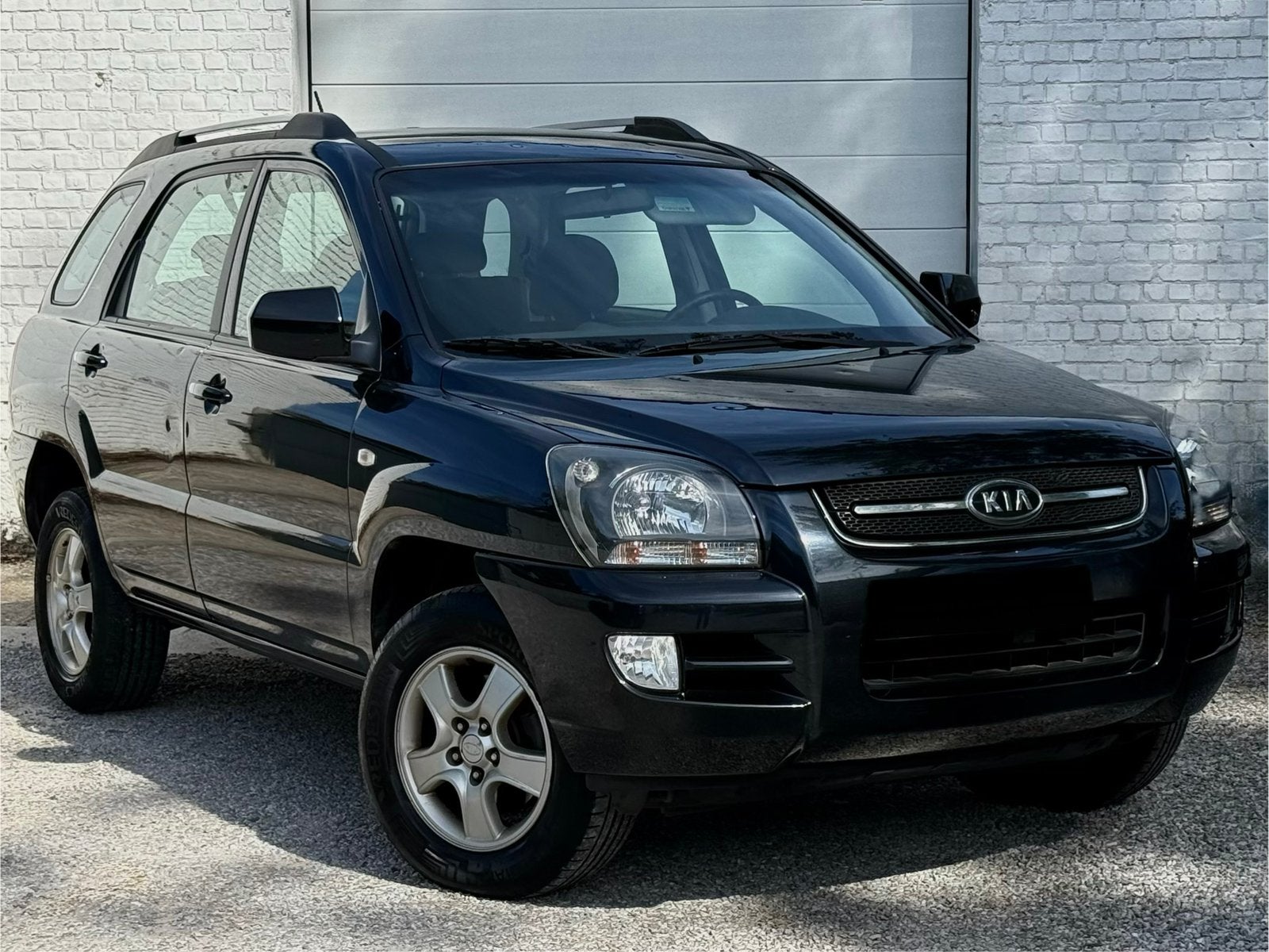 Kia Sportage 2.0i*1stehands*150.000km*benzine*2008*, Dealer onderhouden, Stof, Zwart, Zwart