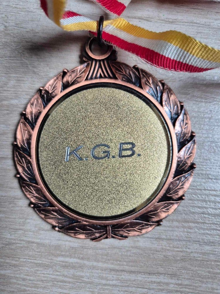Carnaval medaille K.G.B., Enlèvement ou Envoi