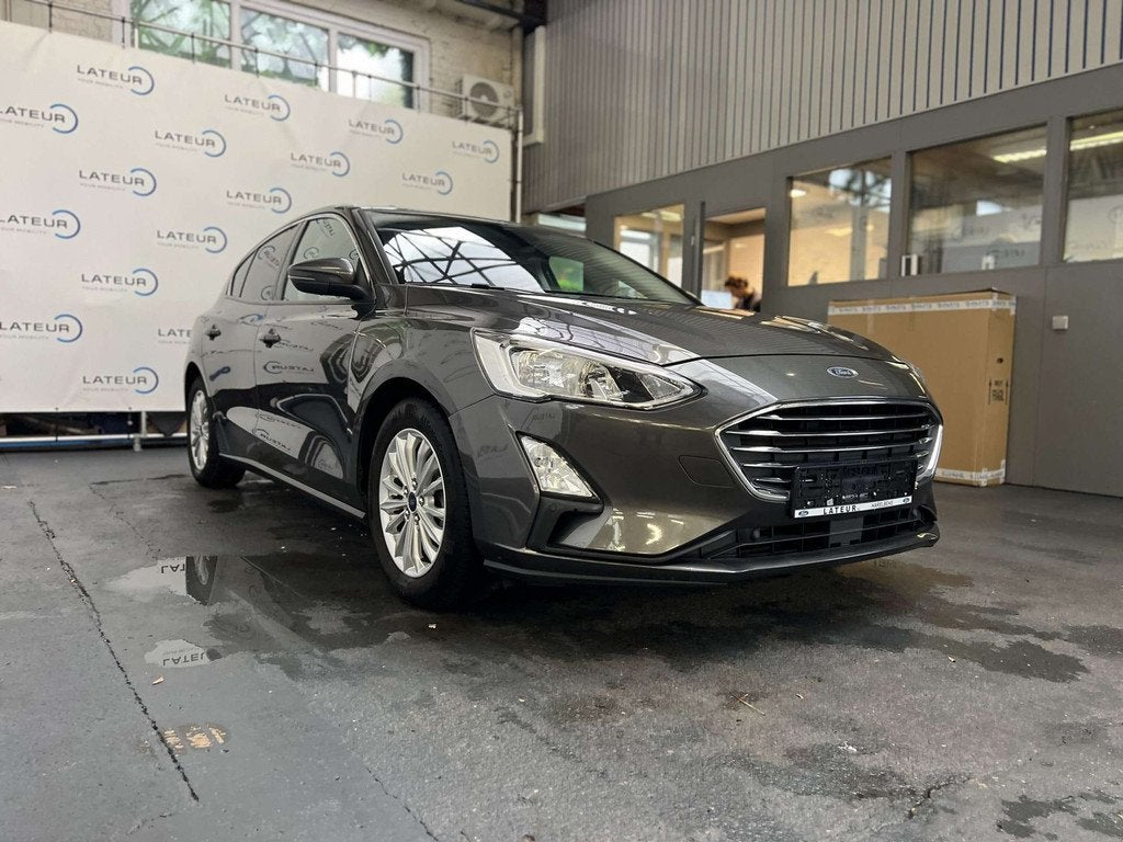 Ford Focus Titanium Business 1.0i EcoBoost 125pk / 92kW M6 -, Auto's, Focus, Stof, Gebruikt, Euro 6