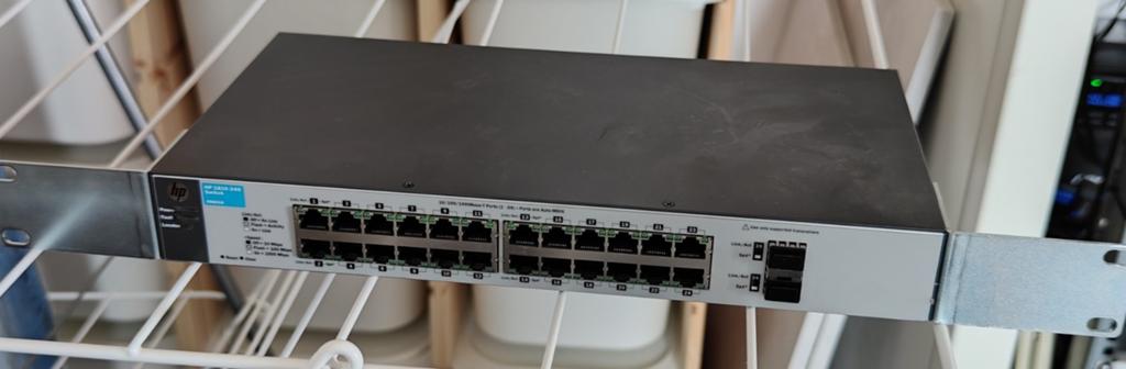 Managed switch HP Procurve 1810-24g v2 gratis verstuurd, Computers en Software, Netwerk switches, Ophalen of Verzenden