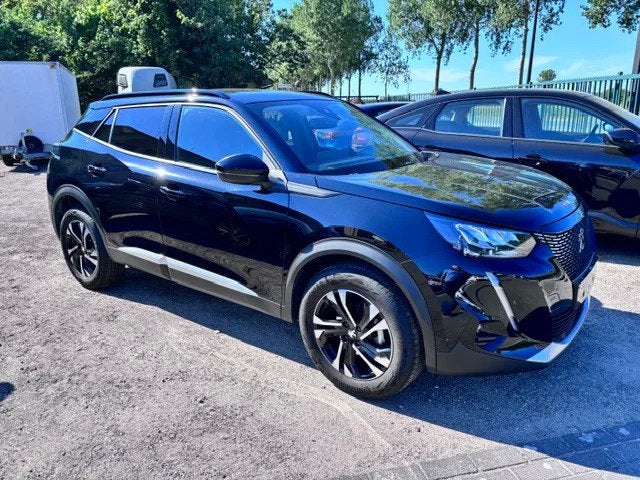 Peugeot 2008 (bj 2022), Auto's, Peugeot, Gebruikt, Euro 6, 1199 cc, Zwart