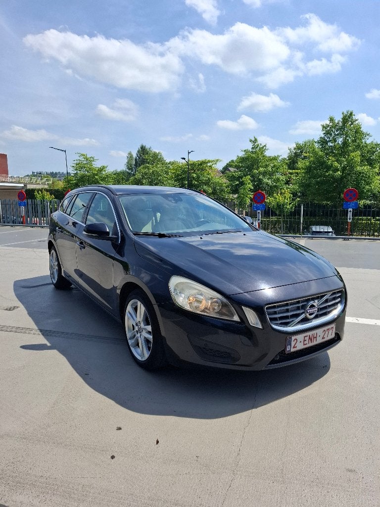Volvo V60 1.6 Diesel 2011, Auto's, Volvo, Voorwielaandrijving, Beige, Leder en Stof, Zwart