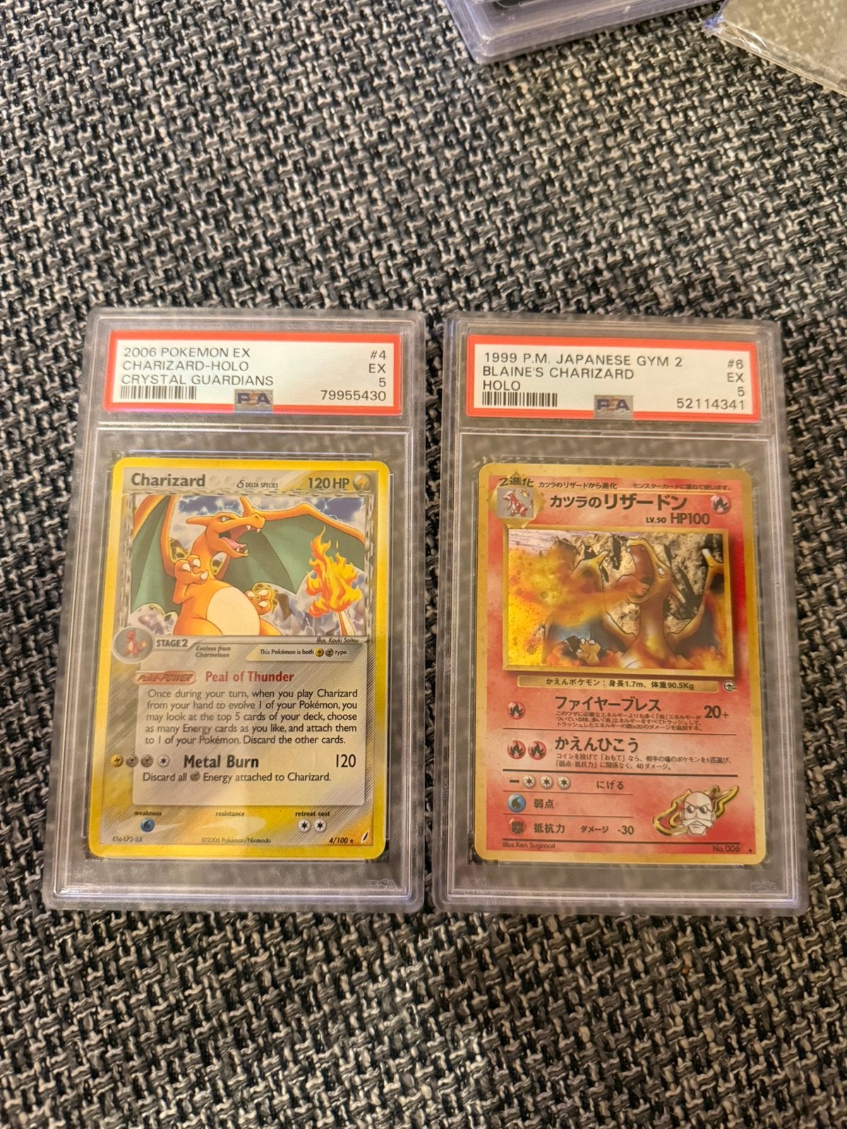 2 maal Charizard PSA 5, Ophalen of Verzenden, Zo goed als nieuw