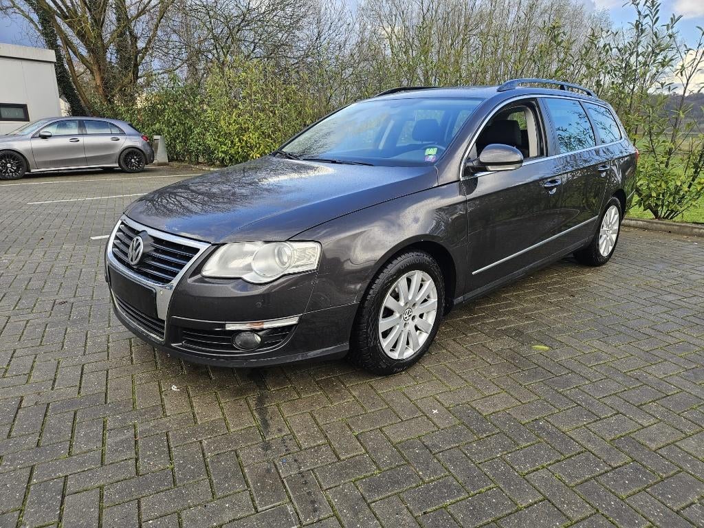 Volkswagen Passat 1.6 TDi SCHUIFDAK TREKHAAK, Auto's, Voorwielaandrijving, Stof, Zwart, 4 cilinders