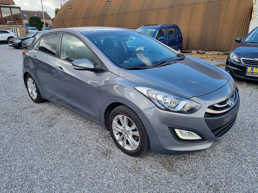HYUNDAI I30 1.4i 5-DEURS/AIRCO/VELGEN/EXPORT/MERCHANT, Auto's, Voorwielaandrijving, Euro 5, Stof, Zwart