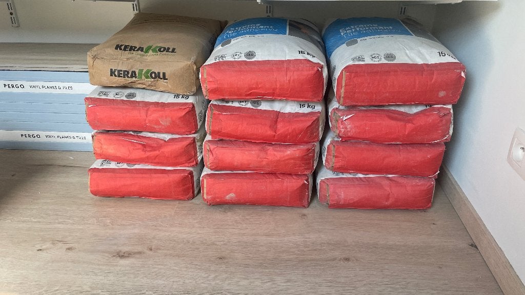 12 zakken tegellijm (11x Proflex Extra + 1x Kerakoll Flex), Enlèvement, Comme neuf, Autres matériaux, Carrelage de sol