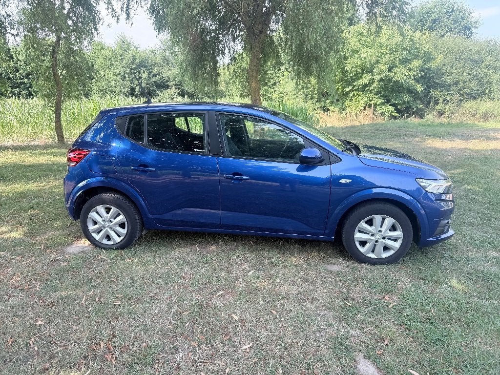 DACIA SANDERO 1,0 i Airco, Auto's, Dacia, Voorwielaandrijving, Dealer onderhouden, Stof, Blauw