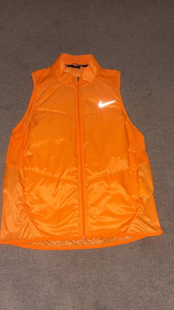 Nike running bodywarmer., Ophalen of Verzenden, Nieuw, Maat 48/50 (M), Oranje