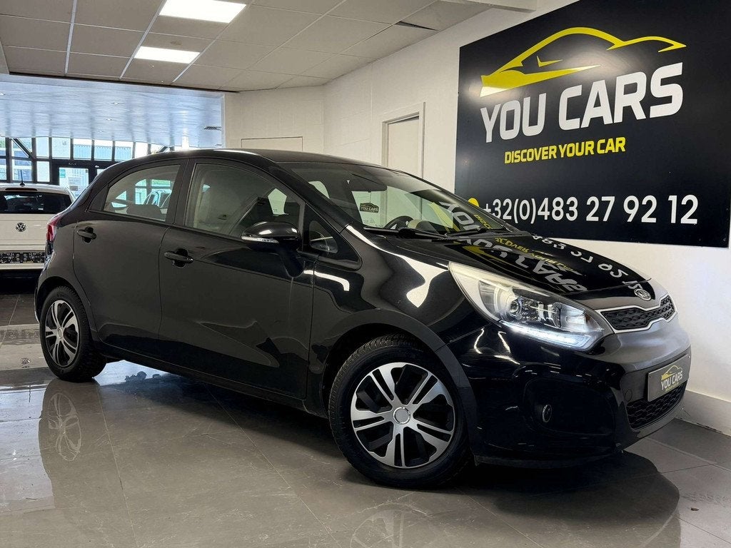 Kia Rio 1.4i Sense 1 Jaar Garantie, Auto's, Euro 5, Gebruikt, Zwart, 1396 cc