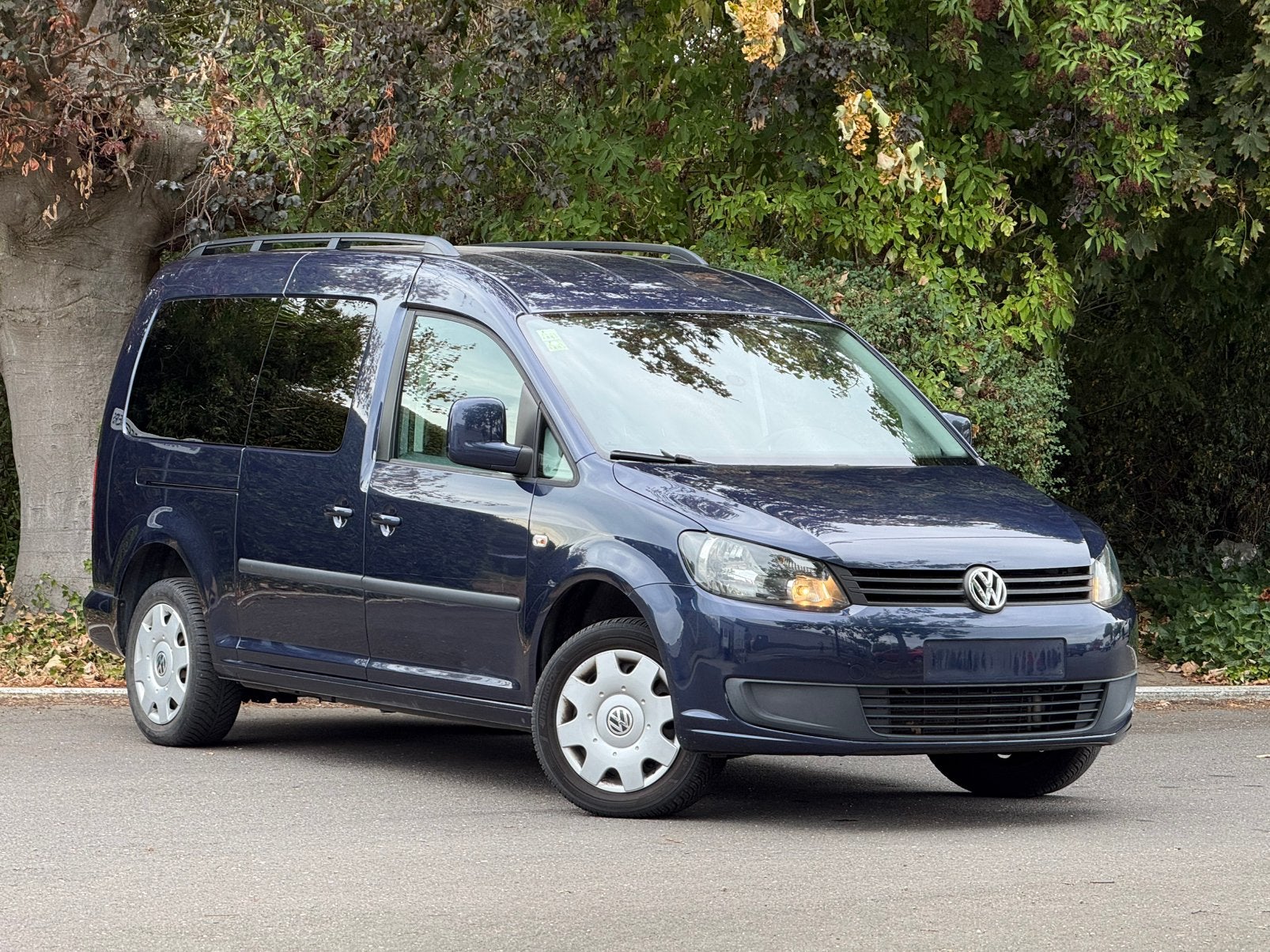 Volkswagen Caddy 1.2 benzine 78.000 km 7 plats, Auto's, Euro 5, Stof, Zwart, Blauw