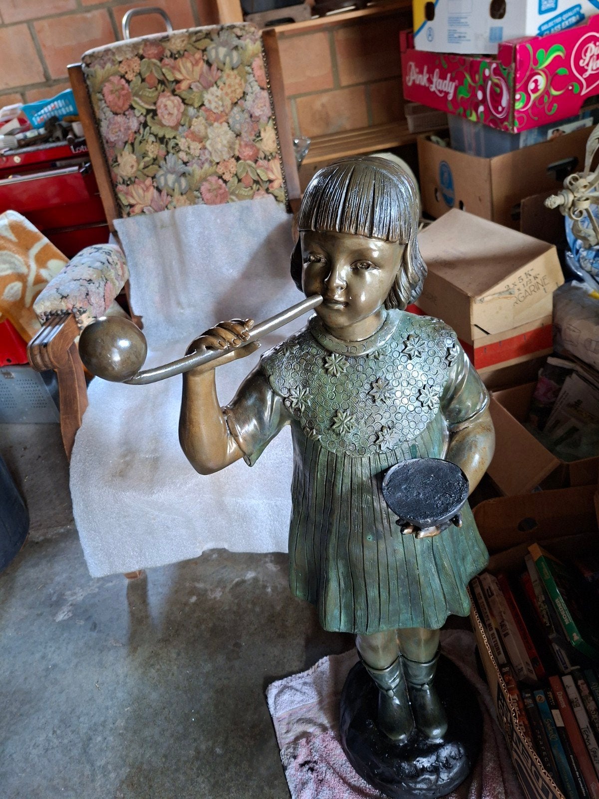Bronzen beeld, Ophalen