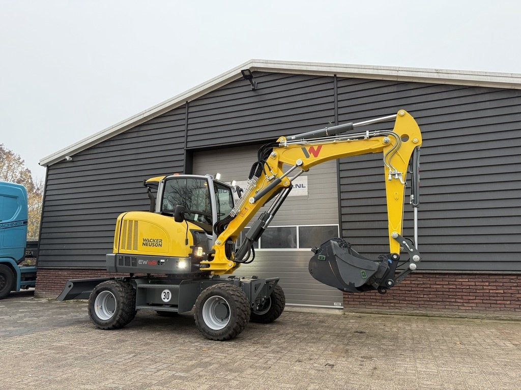 Neuson EW65 mobiele graafmachine NIEUW, Articles professionnels, Machines & Construction | Grues & Excavatrices, Grue