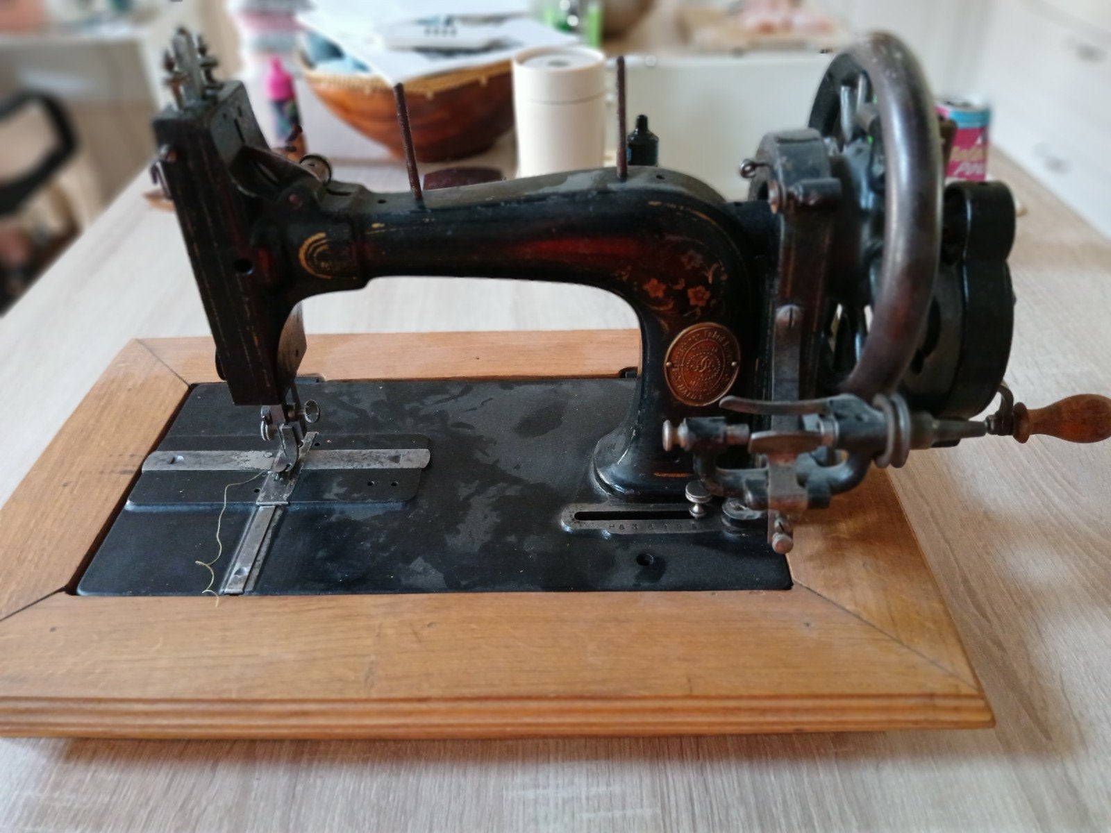 oud naaimachinne, Ophalen