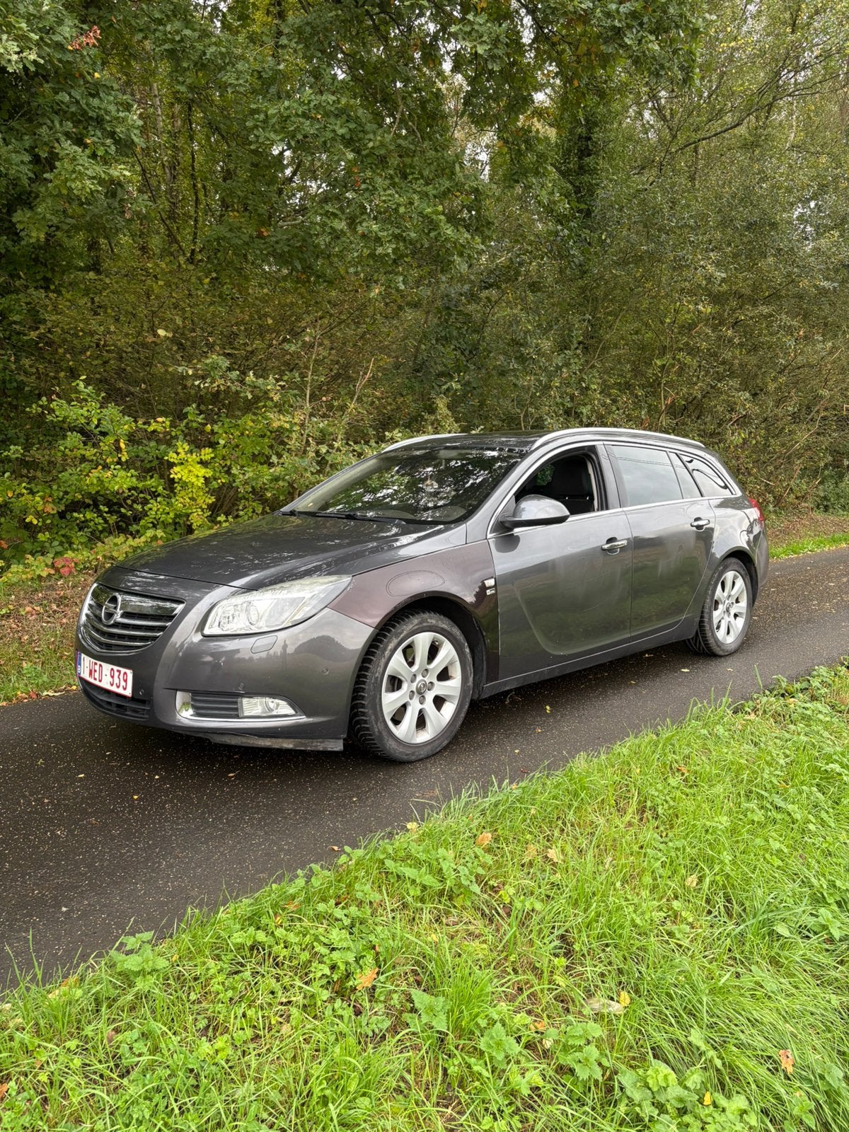 Opel insignia 2009 2.0dcti, Auto's, Zwart, 4 cilinders, Bi-Xenon koplampen, Leder