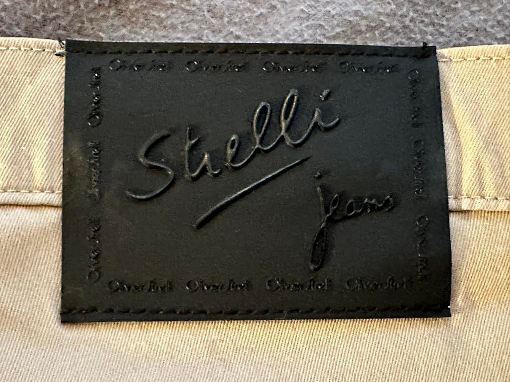 Exclusieve kostuumbroek Olivier Strelli in nieuwstaat, Kleding | Heren, Maat 52/54 (L), Beige, Ophalen of Verzenden, Zo goed als nieuw