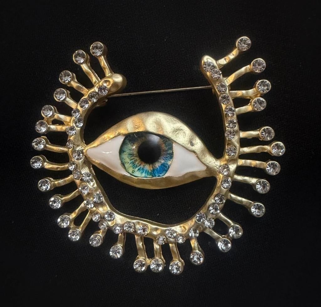 Gouden broche met oogdesign en strass steentjes, Overige materialen, 4 tot 7 cm, Nieuw, Ophalen of Verzenden