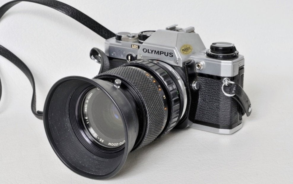 Olympus OM 10 + Olympus 35-70mm 1:4 zoom + zonnescherm +UV, Audio, Tv en Foto, Ophalen of Verzenden, Zo goed als nieuw, Spiegelreflex