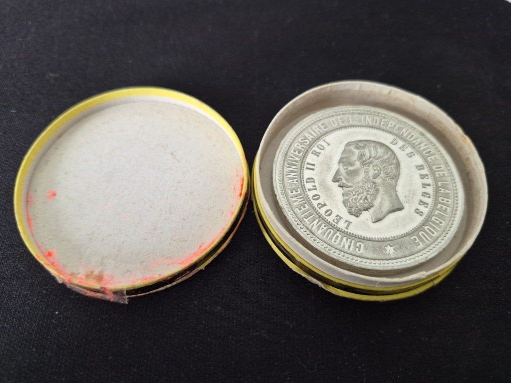 Zilveren/verzelverd medaille, Ophalen