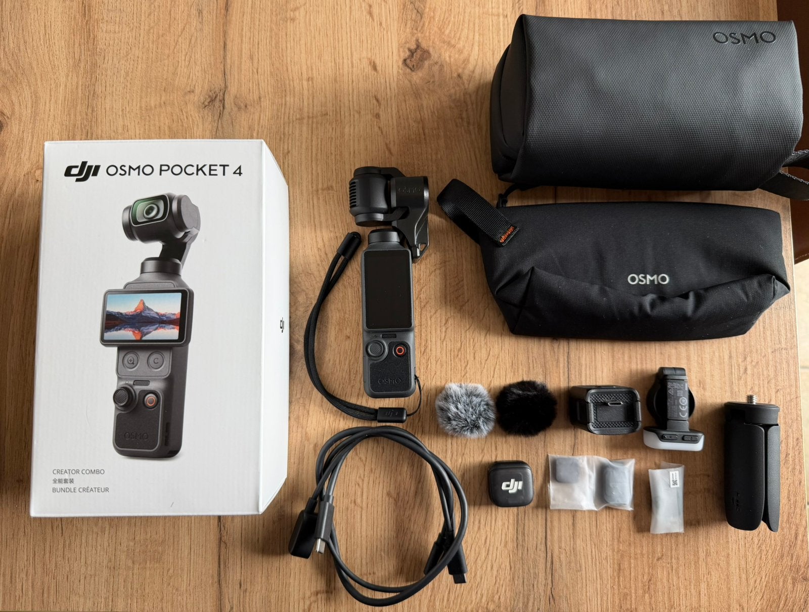 DJI Osmo Pocket 4 Creator Combo in Nieuwstaat, TV, Hi-fi & Vidéo, Enlèvement, Comme neuf, Caméra
