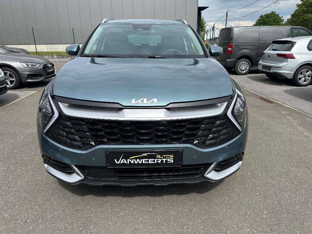 Kia Sportage, 1.6 benzine + elektrisch, HEV, CARPLAY/ CAMERA, Auto's, Stof, 4 cilinders, 1600 cc, 127 g/km