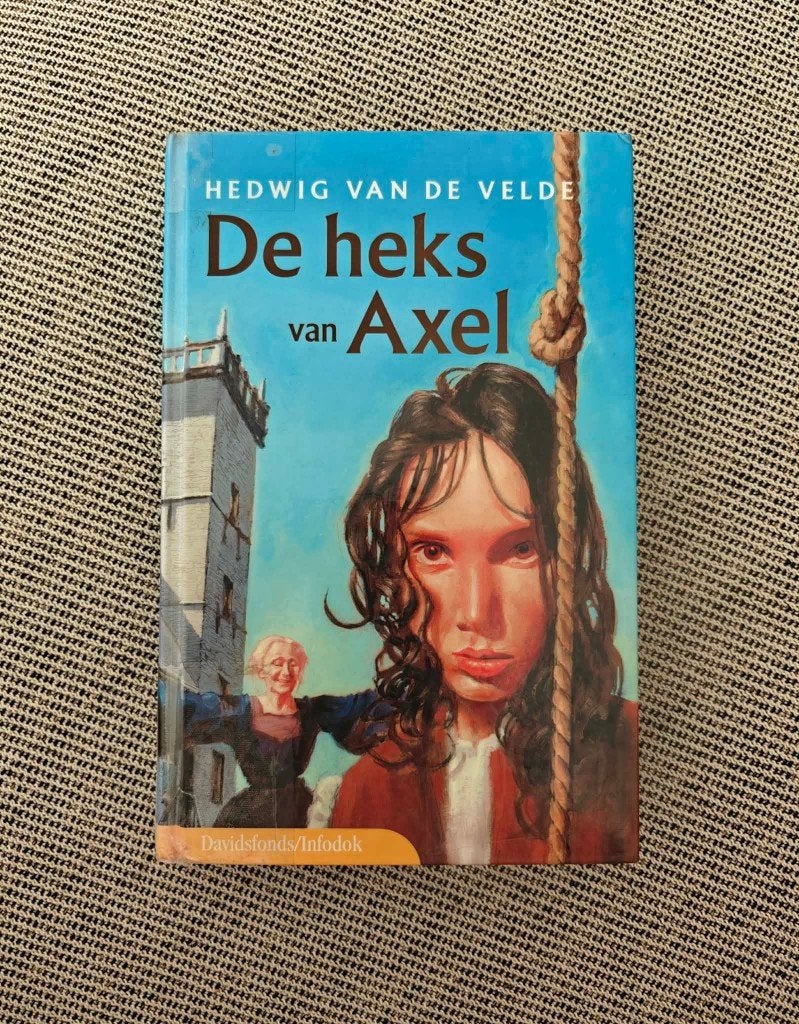 Boek - De heks van Axel - Hedwig Van De Velde - Fictie - €3, Hedwig Van De Velde, Fictie, Ophalen, Gelezen