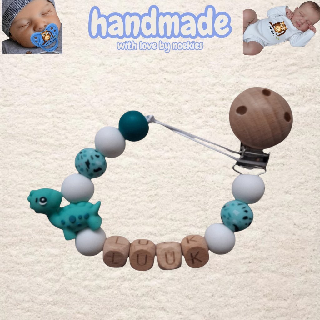 Attache tétine Noekies Name Dino Turquoise White Nr 14, Enlèvement ou Envoi, Neuf, Cadeau d'accouchement