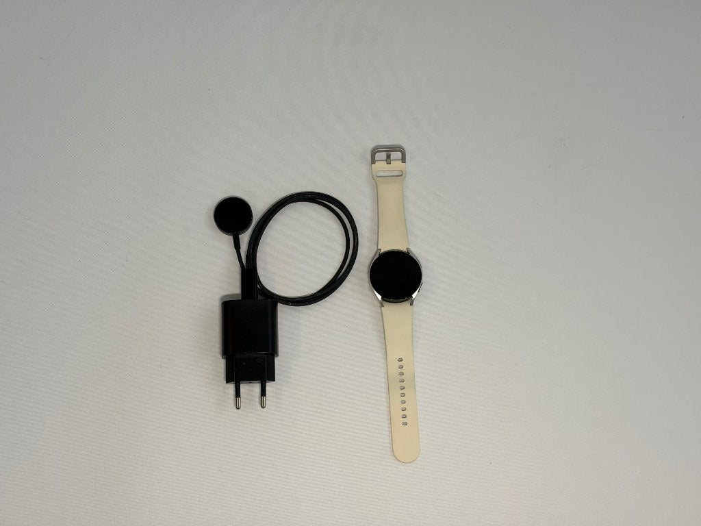Samsung Watch 6 Goud + Creme bandje, Handtassen en Accessoires, Gebruikt, Ophalen of Verzenden, Samsung, Waterdicht