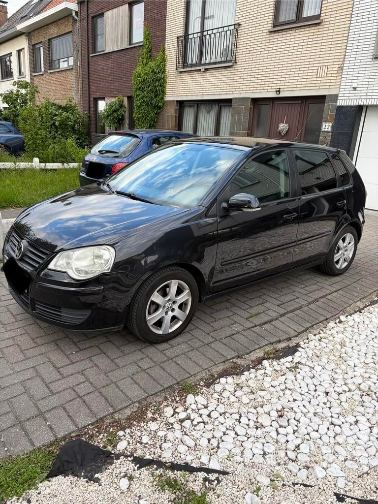 Volkswagen Polo 1.2 Benzine 2007 14dkm euro4, Auto's, Voorwielaandrijving, Stof, 1198 cc, Zwart