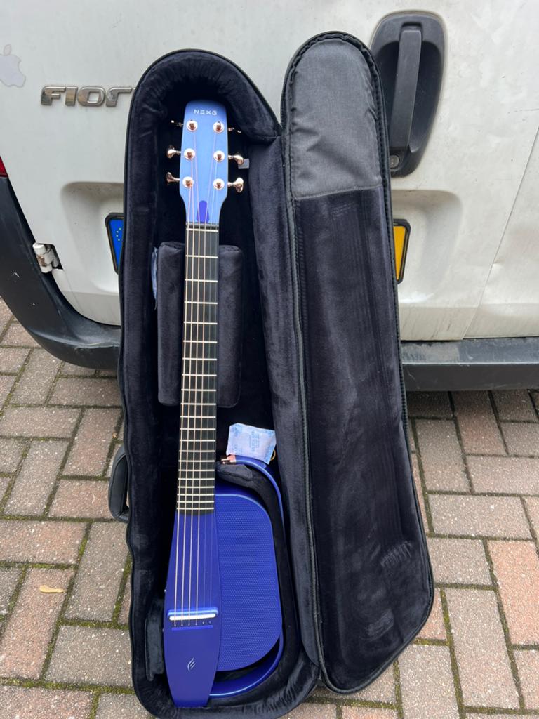 Te koop: Nieuwe Enya NEXG 2 Electro Akoestische Gitaar blauw, Enlèvement ou Envoi, Comme neuf, Avec valise